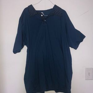 Blue collar shirt.